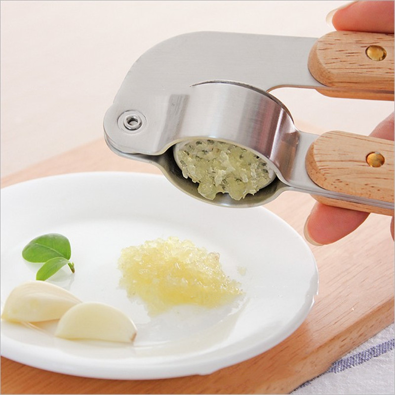 ORANGLES Stainless Steel 304 Garlic Masher & Peeler Set - detailed closeup view - illustrating benefits - Image 3 of 4 | created for all | Shop Stainless Steel 304 Garlic Masher & Peeler Set North Carolina | Free Shipping ORANGLES