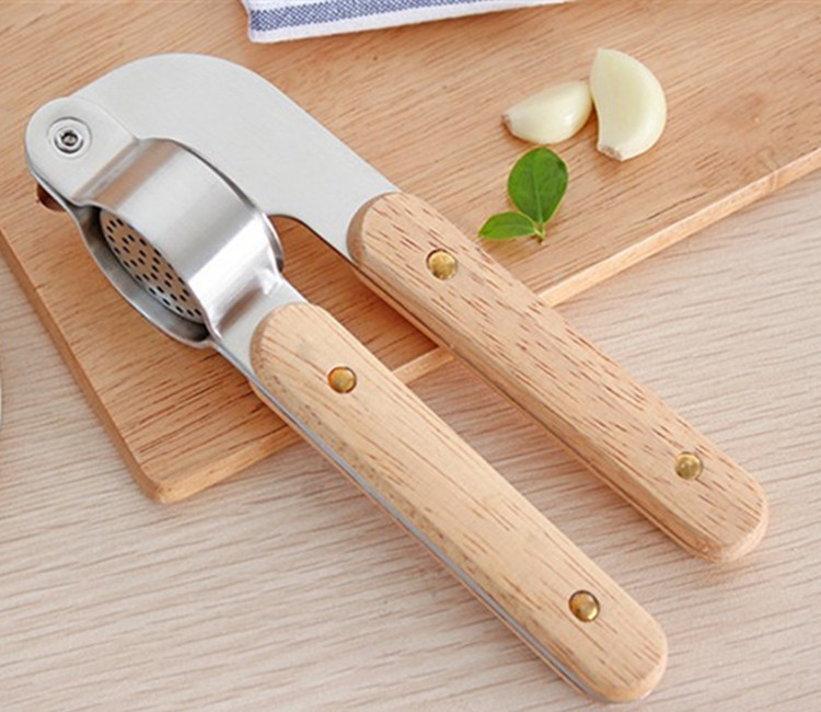 ORANGLES Stainless Steel 304 Garlic Masher & Peeler Set - angled perspective - presenting advantages - Image 4 of 4 | fits any environment | Purchase Stainless Steel 304 Garlic Masher & Peeler Set Michigan | Free Shipping ORANGLES