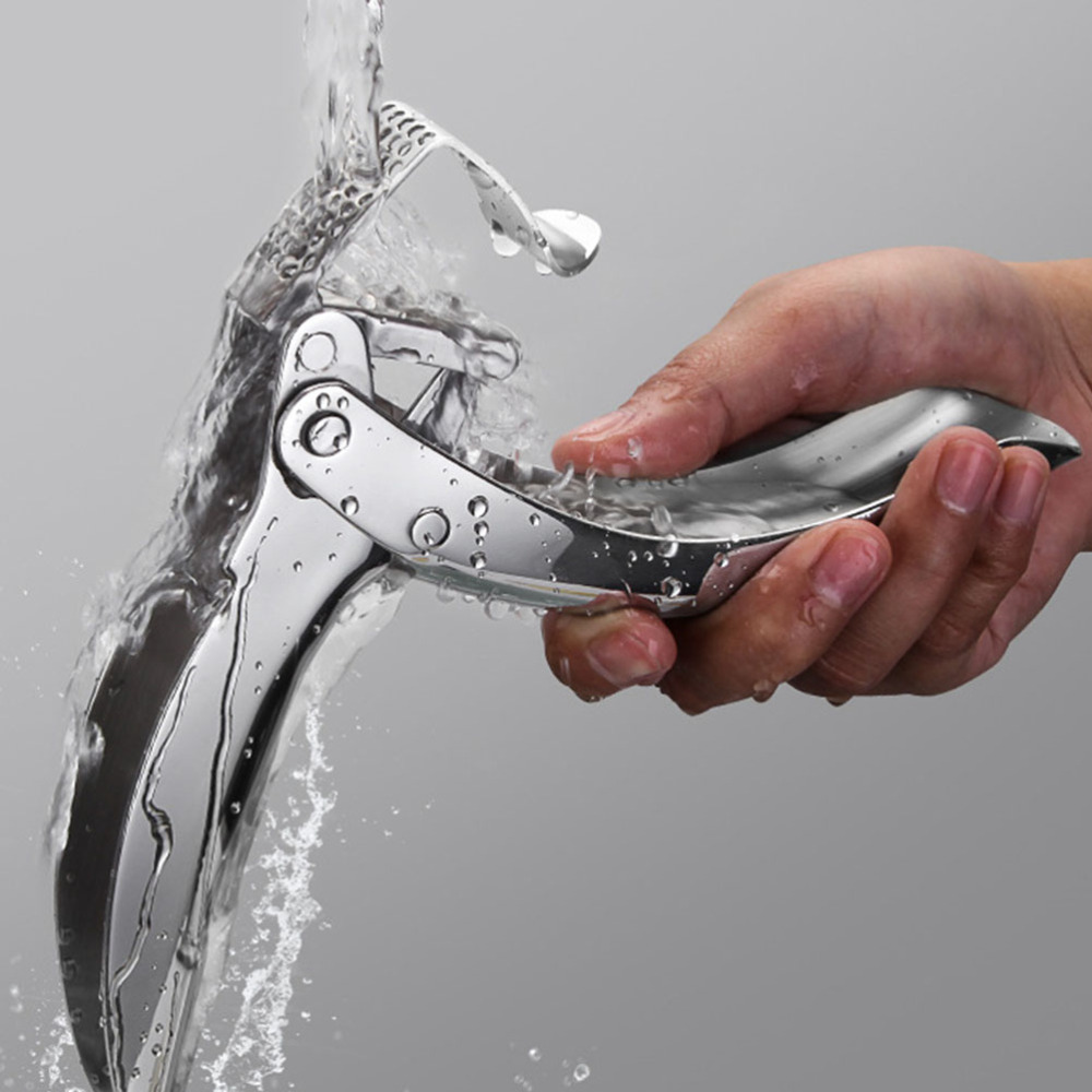 ORANGLES 304 Stainless Steel Manual Garlic Press Masher - high resolution display - exposing craftsmanship - Image 2 of 5 | built for everyone | 304 Stainless Steel Manual Garlic Press Masher for sale Georgia | Free Shipping ORANGLES