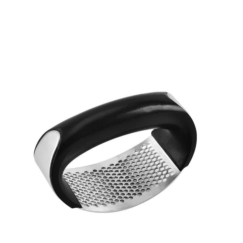 ORANGLES Stainless Steel Garlic Masher & Kitchen Gadget - angled perspective - presenting advantages - Image 4 of 5 | fits any environment | Purchase Stainless Steel Garlic Masher & Kitchen Gadget Michigan | Free Shipping ORANGLES