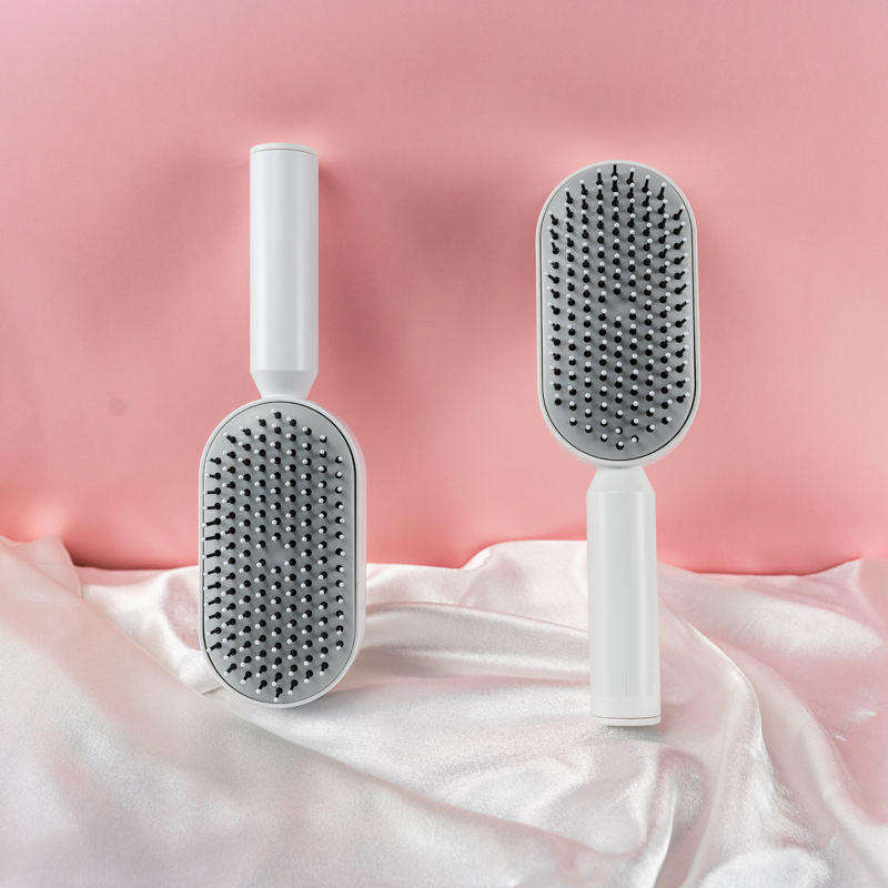 ORANGLES Hair Comb Anti‑Static Detangler with Soft Bristles and Ergonomic Scalp Care Design - detailed closeup view - Image 3 of 4 | great for travel | Texas | Free Shipping ORANGLES