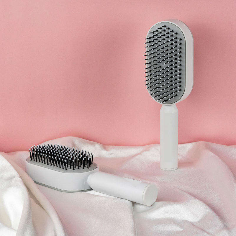 ORANGLES Hair Comb Anti‑Static Detangler with Soft Bristles and Ergonomic Scalp Care Design - angled perspective - Image 4 of 4 | excellent for daily use | New York | Free Shipping ORANGLES