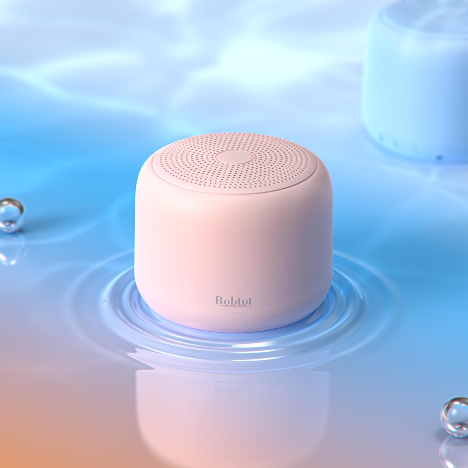 ORANGLES Bobtot Portable Bluetooth Speaker with Strap – Wireless IPX5 Waterproof Mini Speaker, Loud Stereo Sound, 20 Hours Playtime, Built-in Mic, Rechargeable Pink Speaker - angled perspective - Image 4 of 4 | excellent for daily use | New York | Free Shipping ORANGLES